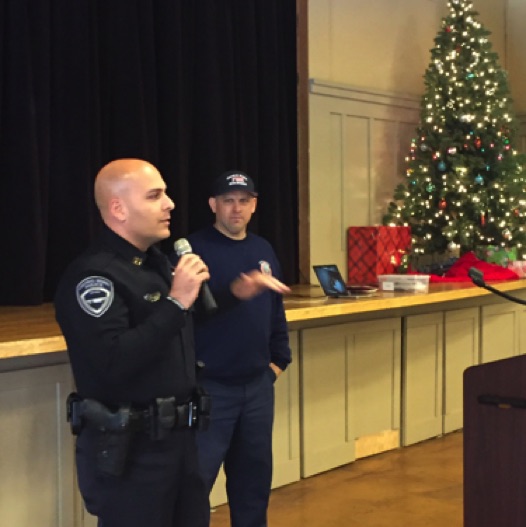 Gift drive leaders Police Capt Kahlili and Firefighter Rutkowski